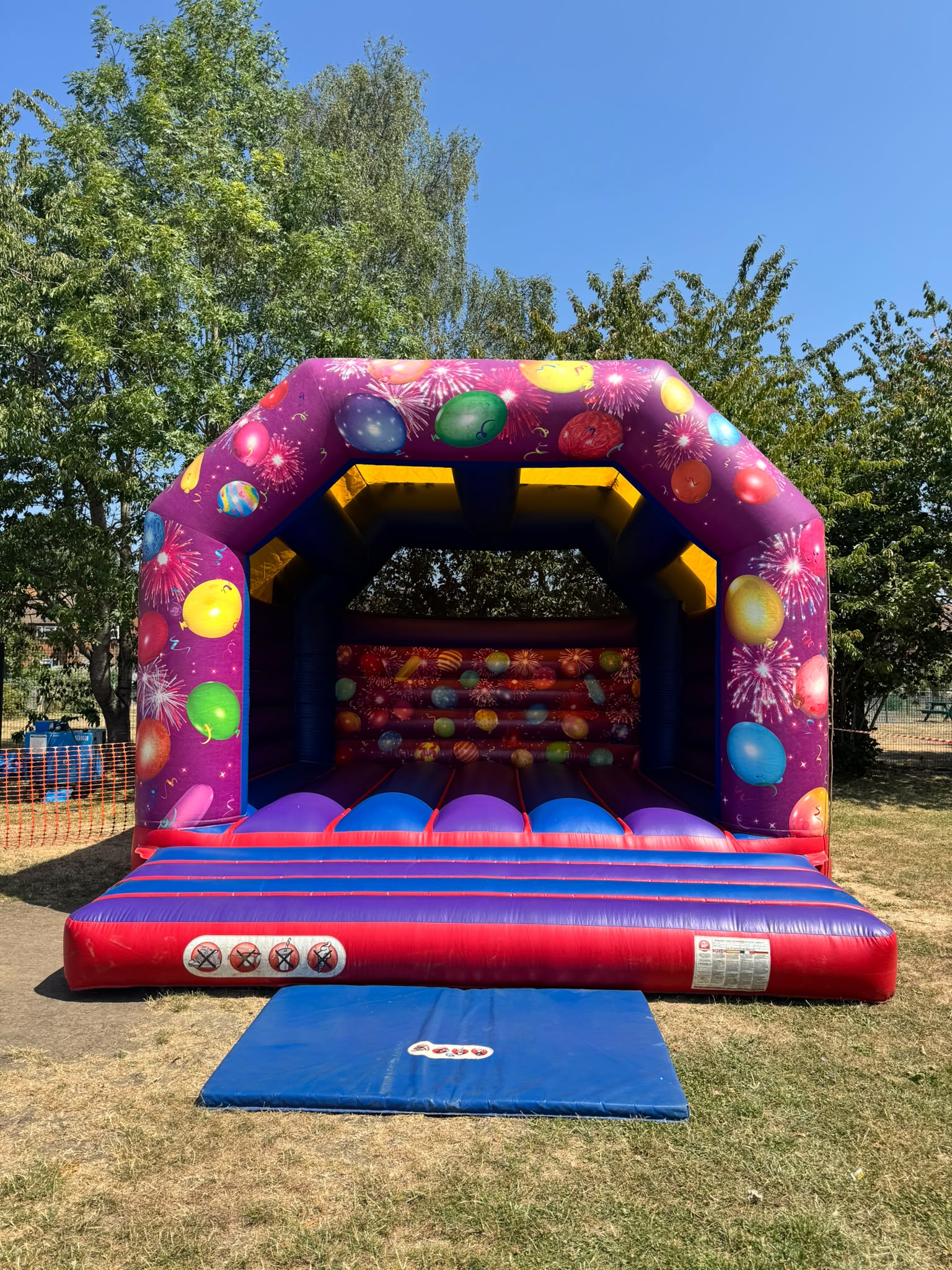 Large purple party bouncy castle