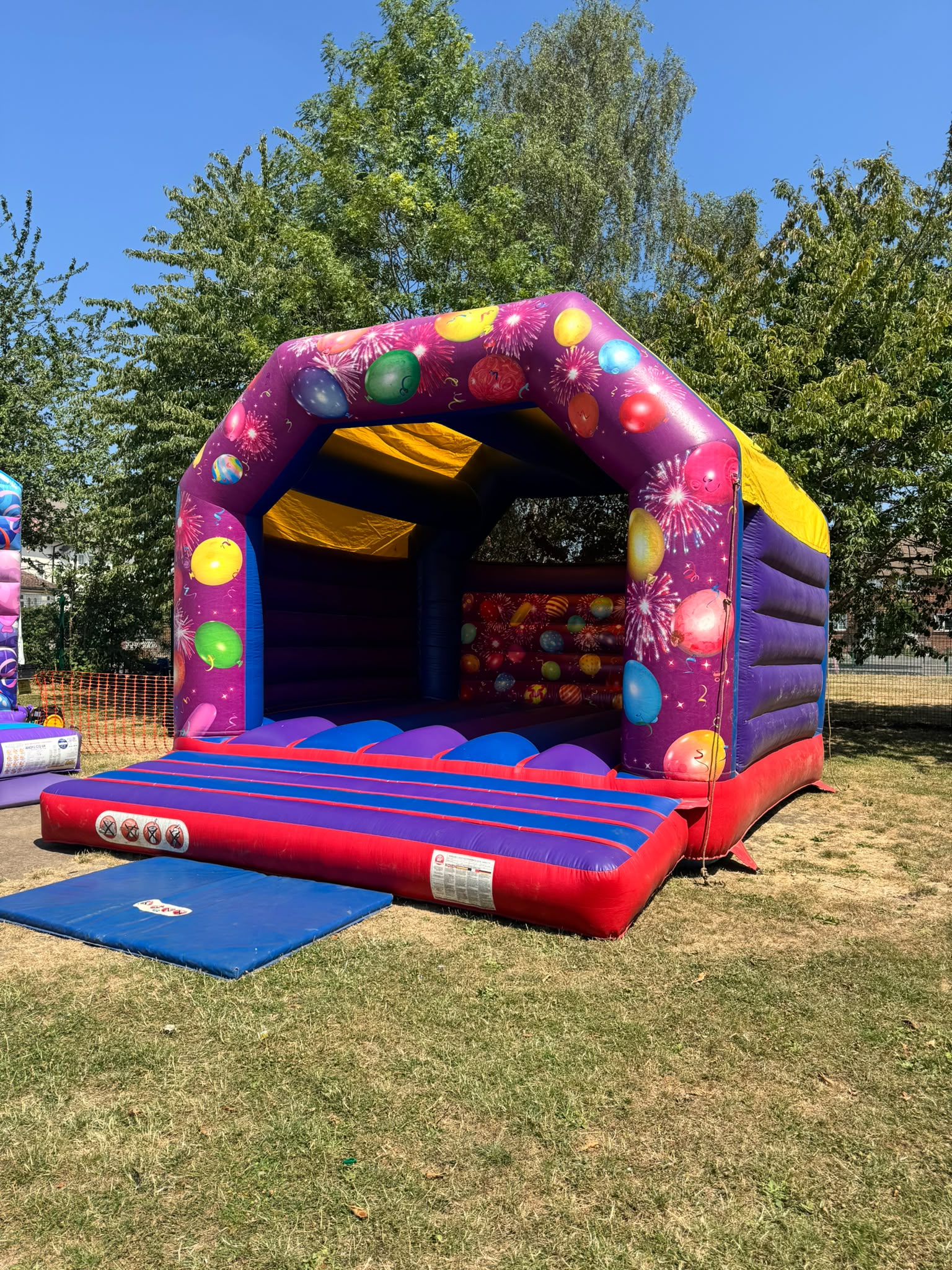 Large purple party bouncy castle